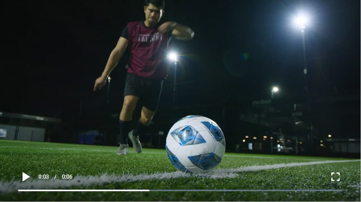 Close shot of a soccer player shooting a penalty